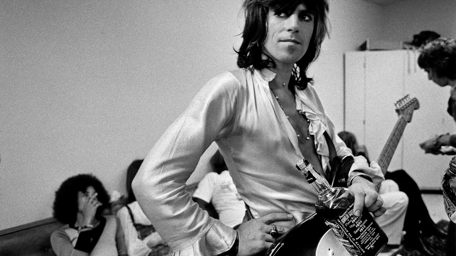 Keith Richards, with Jack Daniels bottle, 1972