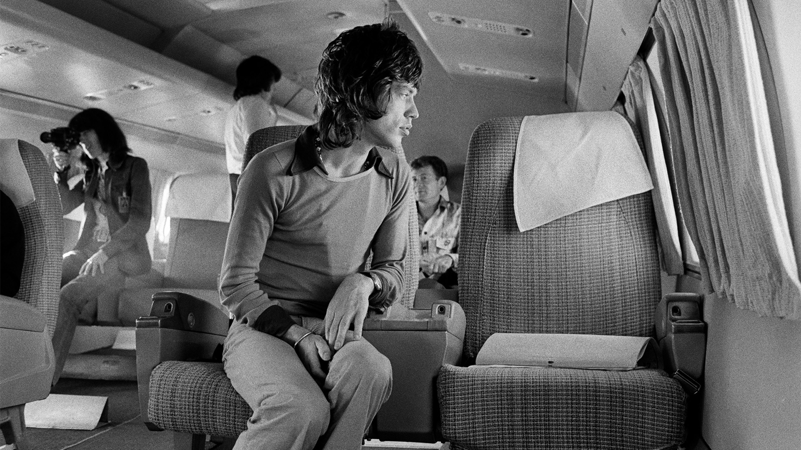 Mick Jagger on airplane to San Diego, 1972