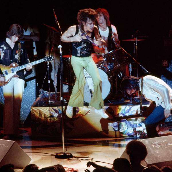 Mick Taylor, Mick Jagger, Keith Richards,and Charlie Watts on stage, 1972