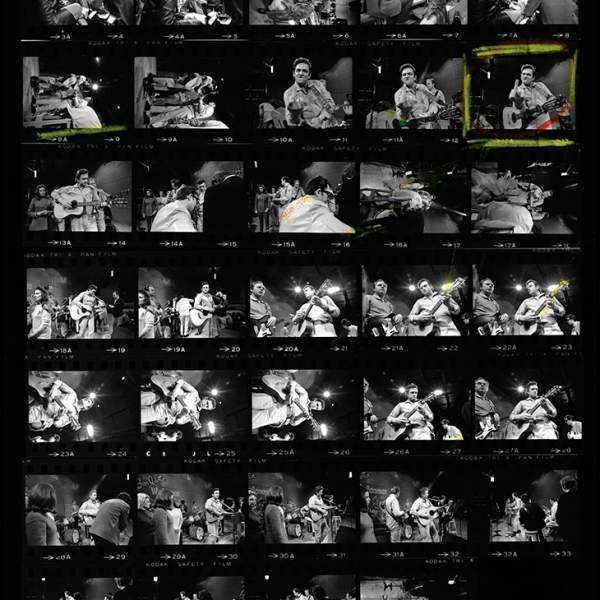 Cash flipping the bird proof sheet, San Quentin Prison, 1969
